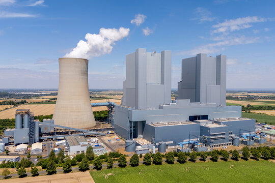 Kraftwerk Neurath lignite power station near Grevenbroich, Germany, generating electricity from brown coal with cooling towers and industrial infrastructure.