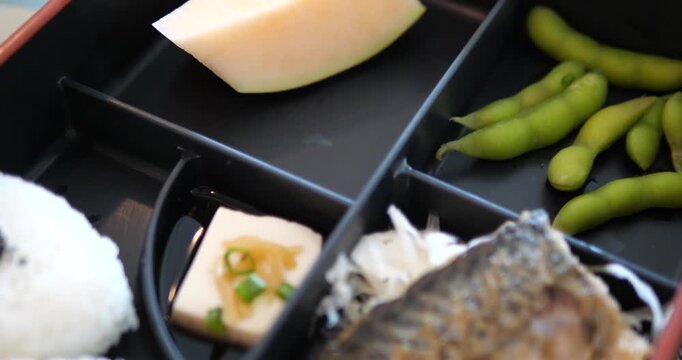Close up of fresh Japanese melon dessert in a bento box