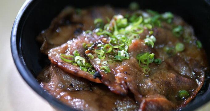 Close up of delicious Japanese grilled pork rice bowl Butadon