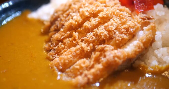 Close up of Japanese Katsu Curry rice bowl with pork cutlet