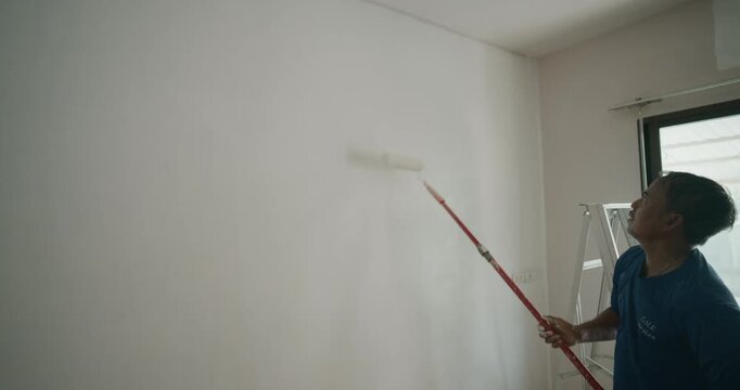 Asian mechanic man color paint interior home building industry