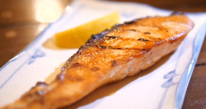 Close up of Japanese Grilled Salmon Teriyaki with rice and miso soup