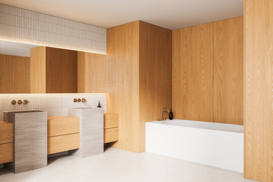 Minimalist wooden bathroom interior featuring modern stone sinks, a sleek white bathtub, warm lighting accents, and refined architecture elements. 3D Rendering