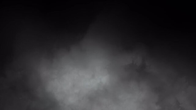 Looping fog and smoke drifting along the bottom of the frame on transparent background