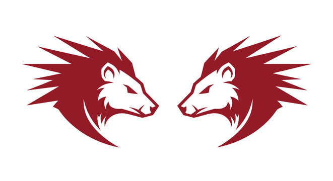 Two Red Stylized Wolf Heads Facing Each Other.