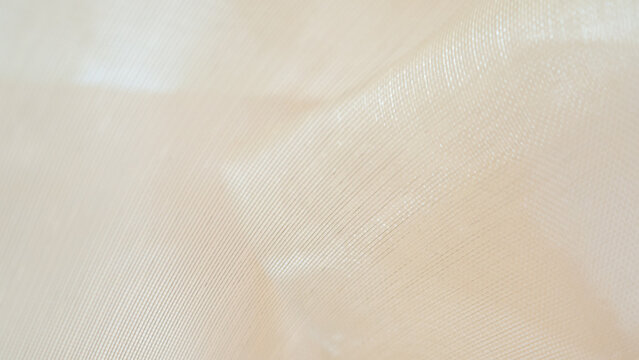 Elegant Cream Beige Silk Fabric Texture Background with Soft Waves and Fine Weave