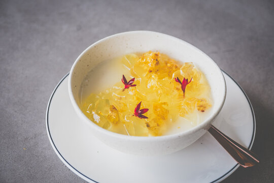 Soy Beancurd with Osmanthus Jelly Housemade silk, soft chilled beancurd with osmanthus jelly & edible Gather & Harvest's pentas flower