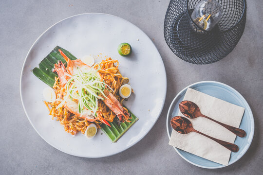 Dry Laksa with Charred Prawns. Ah Hua Kelong's XL Tiger Prawns, laka rempah-fried noodles, local quail eggs