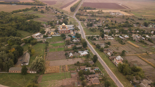 View from above of a Ukrainian village with a church in Sumy region