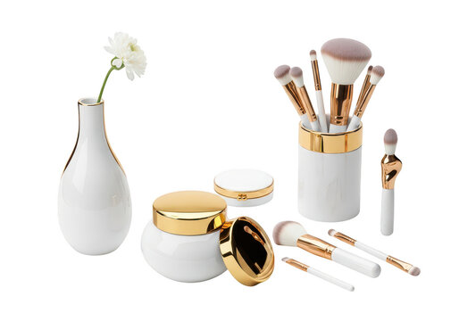 Luxury cosmetic makeup brushes and cream jar with flower
