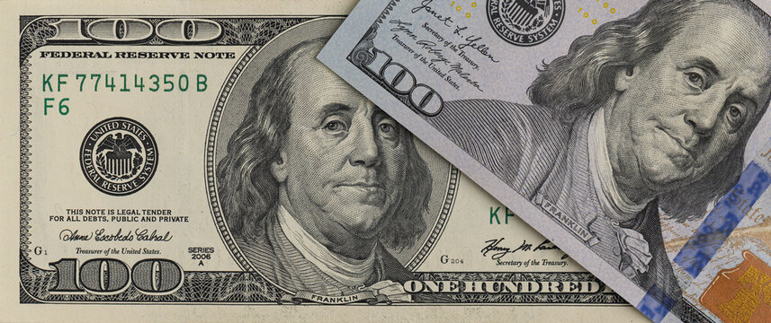 Close up macro shot of front and back sides of one hundred US dollar banknotes