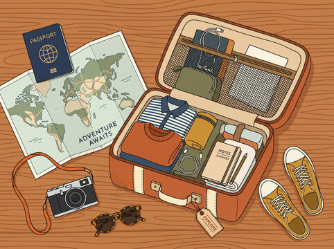 Travel essentials in an open suitcase.
