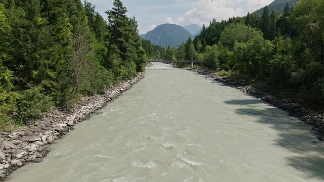 Aerial view of the Otztaler Ache River in Tyrol Austria flowing through alpine forests and mountain valleys showcasing natural beauty and tourism