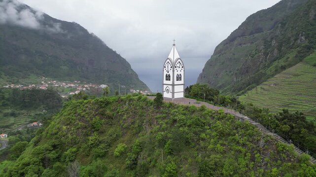 Aerial orbit shot around Capelinha de Nossa Senhora de Fatima chapel in Madeira