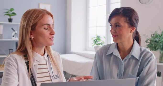 Patient have conversation with a nurse or doctor during a hospital checkup. Discussing medical care, receiving professional advice, and ensuring healthcare needs are addressed during the appointment.