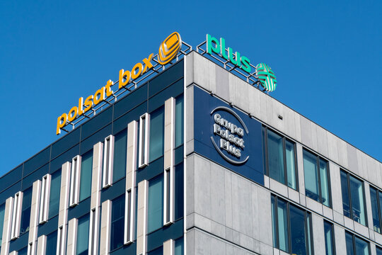 Warsaw, Poland - April 13, 2026: Polsat Box and Plus logos on office building facade