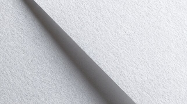 Abstract background featuring white paper texture with sharp diagonal fold line separator.