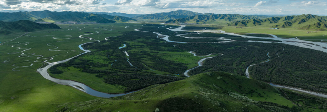 Epic Aerial Panorama of Yellow River Wetland: Mountain Ranges, Braided Water Systems and Winding Rivers in Zoige Grassland