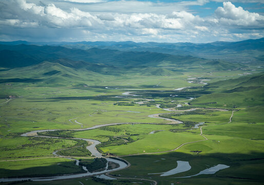 Epic Aerial Panorama of Yellow River Wetland: Mountain Ranges, Braided Water Systems and Winding Rivers in Zoige Grassland
