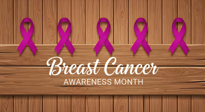 Breast Cancer Awareness Month ribbons. Pink awareness symbols on a rustic wooden background.