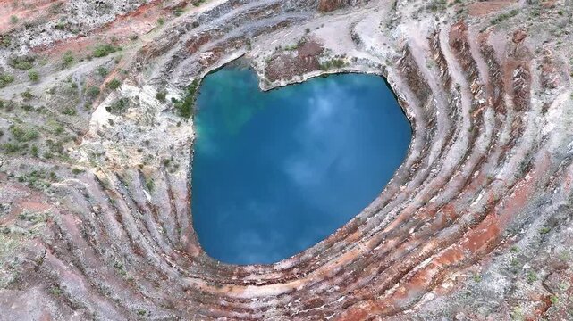 Aerial View of the Abandoned Mary Kathleen Uranium Mine Open Pit with Vibrant Blue Water, Outback Queensland Australia