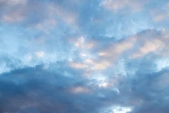 Dramatic Evening Sky with Sunlit Cumulus Clouds