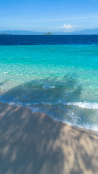 Turquoise Water On A Sandy Beach