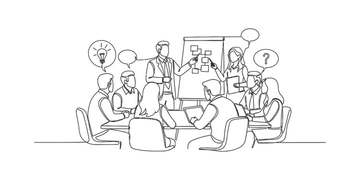 Business team collaborating in a meeting room during a brainstorming session.