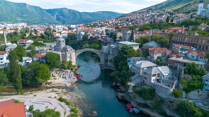 Top down aerial drone view of the historic Stari Most Mostar Old Bridge over Neretva river in Bosnia and Herzegovina © Esin Deniz
