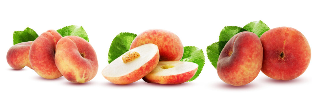 Fresh peaches and peach slices isolated on a white background