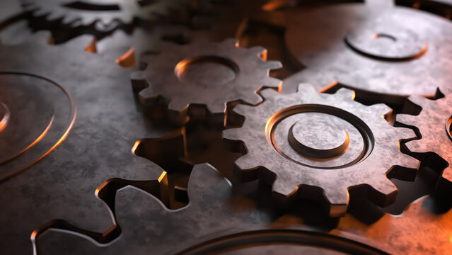 Interlocking metal gears meshing together in close-up, set against a warm, glowing industrial background with visible textures and highlights.