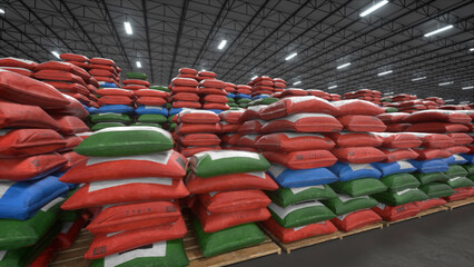 Fototapeta premium Stacks of red, green, and blue sacks labeled '778/9' sit on wooden pallets inside a large warehouse with a high metal truss ceiling and fluorescent lighting.