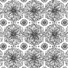 Fototapeta premium intricate hand-drawn black and white floral mandala pattern with repeating symmetrical flowers and small decorative rosettes, elegant calming ornamental design