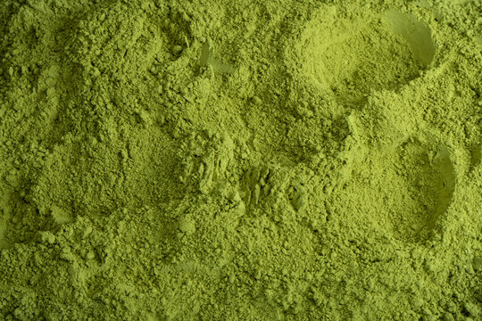 Matcha tea, matcha powder as a background.