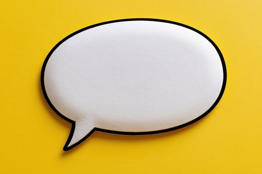 The Speech Bubble on a Bright Yellow Backdrop Captures Playful Communication