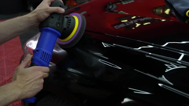 Comprehensive automotive detailing process in 4K. Orbital polishers applied to remove clear coat damage, maximize gloss, and preserve the paint