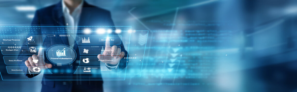 Financial analyst reviewing markets using hands evaluating core Financial Analytics metrics upon a glowing virtual screen projecting market growth. Maximizing corporate profit returns now.
