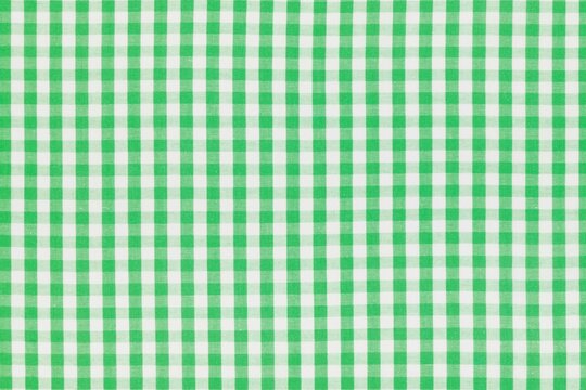 Green gingham fabric pattern. Textured checkered material. Seamless design background