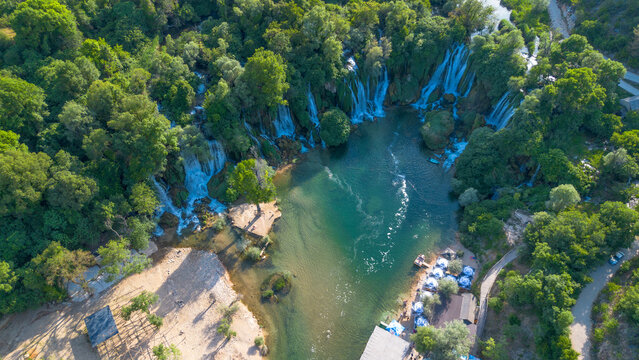 Top Down Aerial View of Beautiful Kravica Waterfalls and Turquoise Lake in Bosnia and Herzegovina