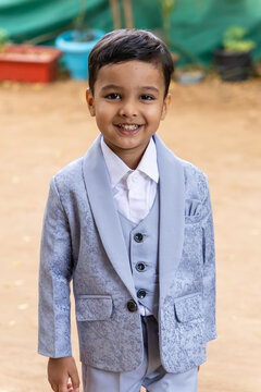 Charming Little Boy In Elegant Outfit Smiling During For AI Facial Emotion Training Model