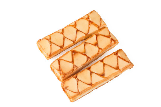 Top view of traditional italian sfogliatine glassate glazed puff pastry biscuits isolated on white background