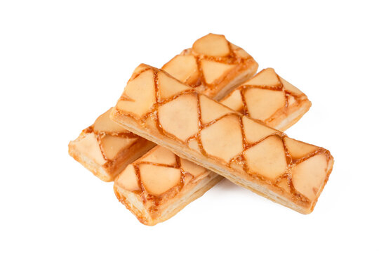 Top view of traditional italian sfogliatine glassate glazed puff pastry biscuits isolated on white background