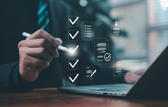 Business forms, checklists business people are marking digital checkboxes on their laptops. Document verification, checklists, task management, review process, modern digital workspace.