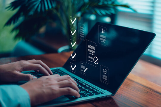 Business forms, checklists business people are marking digital checkboxes on their laptops. Document verification, checklists, task management, review process, modern digital workspace.