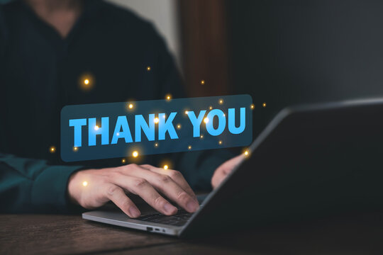 The concept of gratitude in business. Displaying thank-you messages from a laptop. A digital presentation. A gift of gratitude.