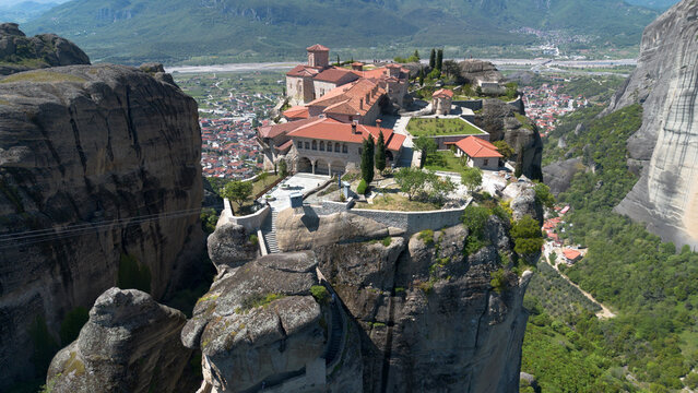 Aerial view of the Holy Trinity Monastery grounds on a high rock formation in Meteora Greece