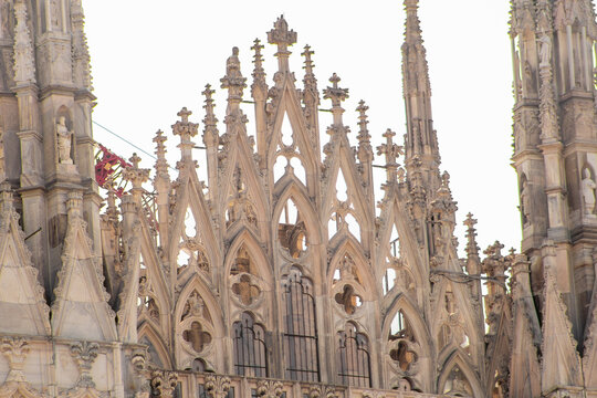 Gothic Italian Architecture Detail of Milan Cathedral with Intricate Spires and Stone Carvings. Italy white marble Duomo di Milano
