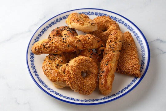 Traditional Turkish savory cookies with sesame and black cumin seeds known as kandil simidi