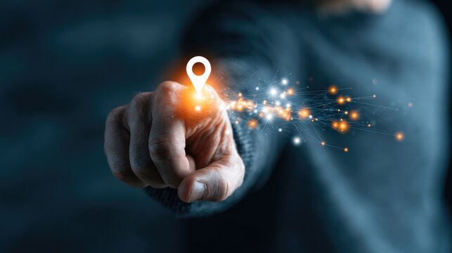 A finger points to a glowing map pin, triggering digital light trails