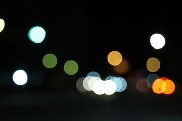 Abstract City Traffic Bokeh Background with Defocused Night Lights © Sam